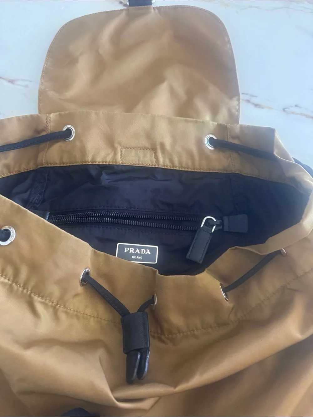 Prada  Metallic Gold Nylon Drawstring Backpack with Flap